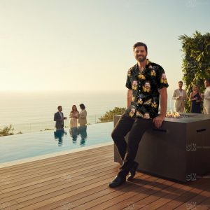 mens big and tall hawaiian shirts worn by confident man at tropical resort showing proper fit and styling