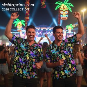 Man wearing stylish black aloha shirt with tropical print at beachside setting showing versatile Hawaiian shirt fashion