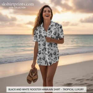 Man wearing black and white Hawaiian shirt at tropical beach resort, showcasing sophisticated monochrome aloha style